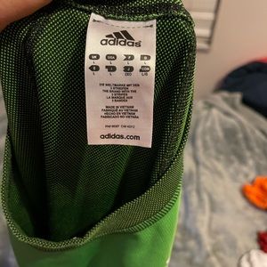 Green sleeveless Adidas shirt